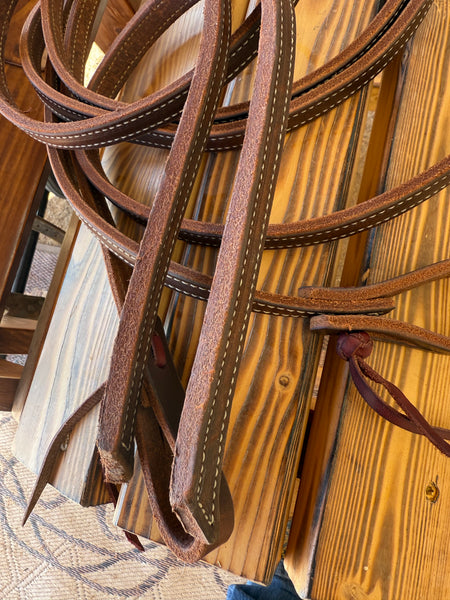 Weighted stitched split reins.