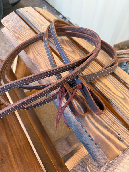 Weighted stitched split reins.